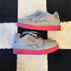 Harsh and Cruel Pink sole sneakers